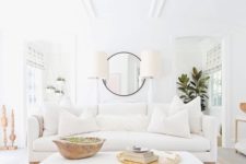 09 white velvet upholstery is a very cozy and welcoming solution for a living room