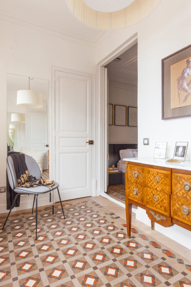A refined wooden sideboard adds chic to the space