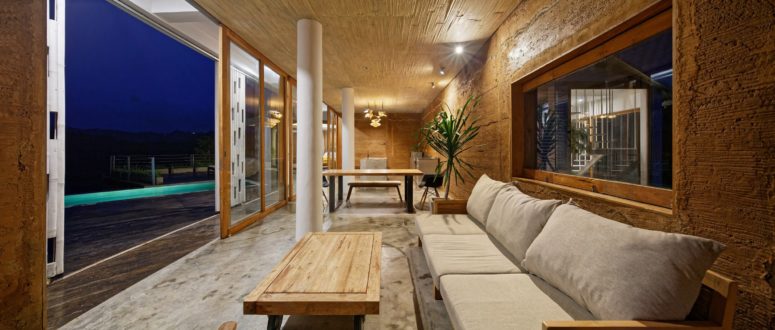 Wood, metal and concrete are used to finish the interiors, and there's some light-colored upholstery, too