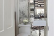 10 a faded mirror wall can make a tiny powder room look bigger and more stylish at the same time