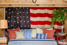 10 a living room and bedroom decorated in patriotic style, with cozy traditional furniture