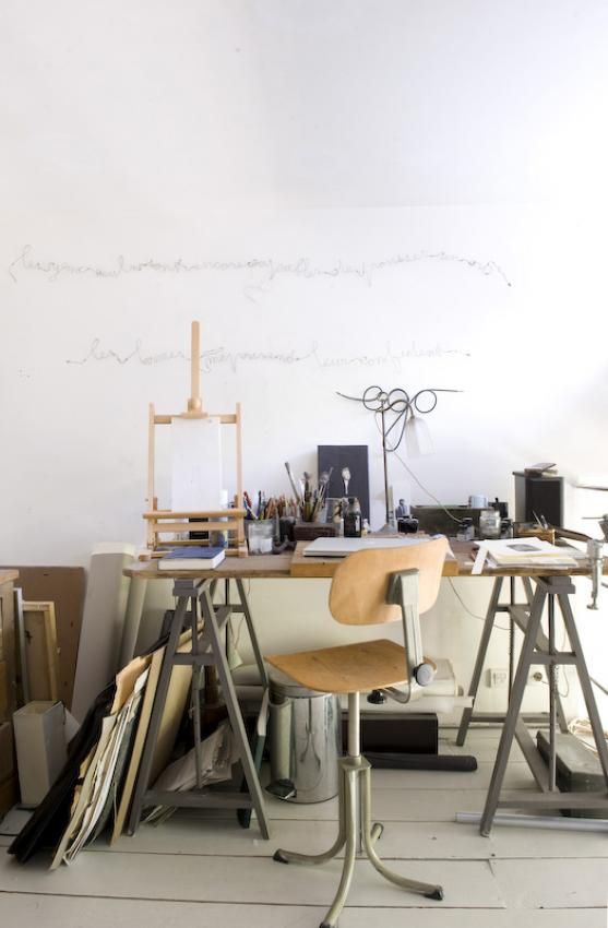 a metal and wood trestle desk for an industrial or masculine home office