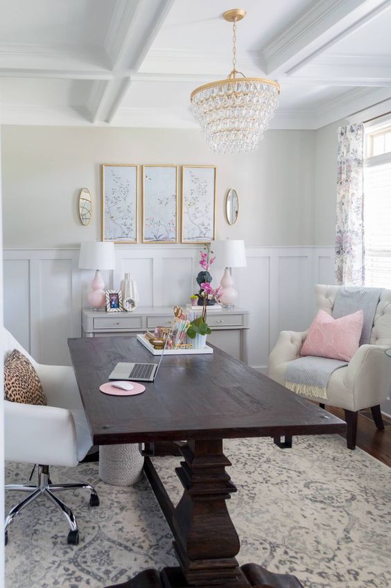 a dark stained trestle desk makes a statement in a giirlish home office