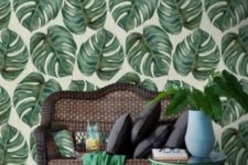 15 monstera leaf printed wallpaper echoes with a green coffee table and blanket