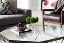 17 a geometric coffee table with a metal base and a geo glass tabletop will add a modern feel, and geo decor is very popular