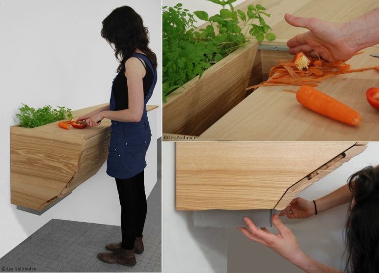 a countertop with a cutting board and a trash can inside