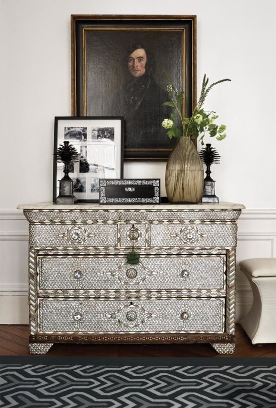 a gorgeous sideboard inlaid with mother of pearls for a refined space