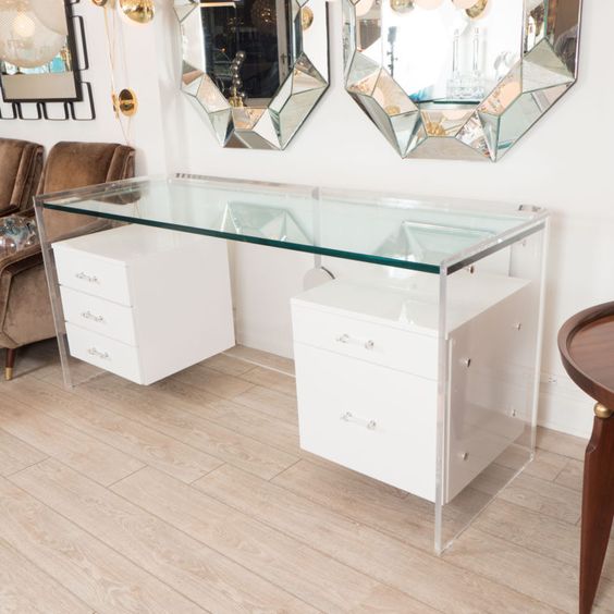 a glass desk looks ethereal, and drawers seem to be floating in the air