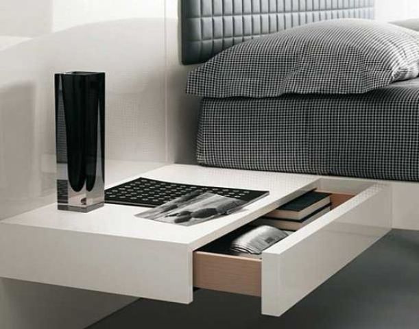a minimalist white bedside table with a drawer is all you need