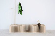 24 a creative entryway bench with storage in between beams is a cool modern idea