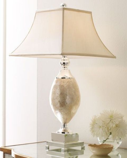 a refined table lamp covered with mother of pearl will add even more chic to your interior