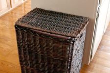 29 simply drop your bin into a wicker hamper for a vessel that adds a bit more style in your kitchen