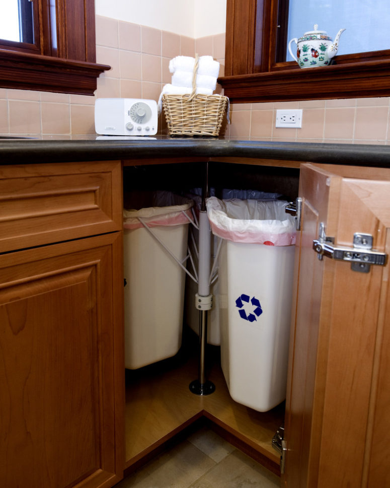 corner cabinets are perfect for trash cans