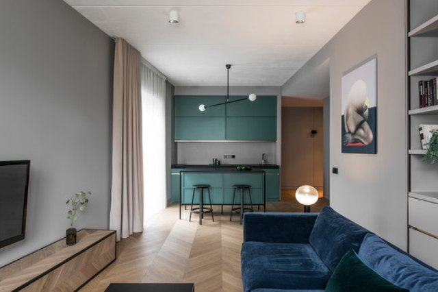 This modern apartment in muted tones is a nice example of how a small dwelling can be stylish and functional