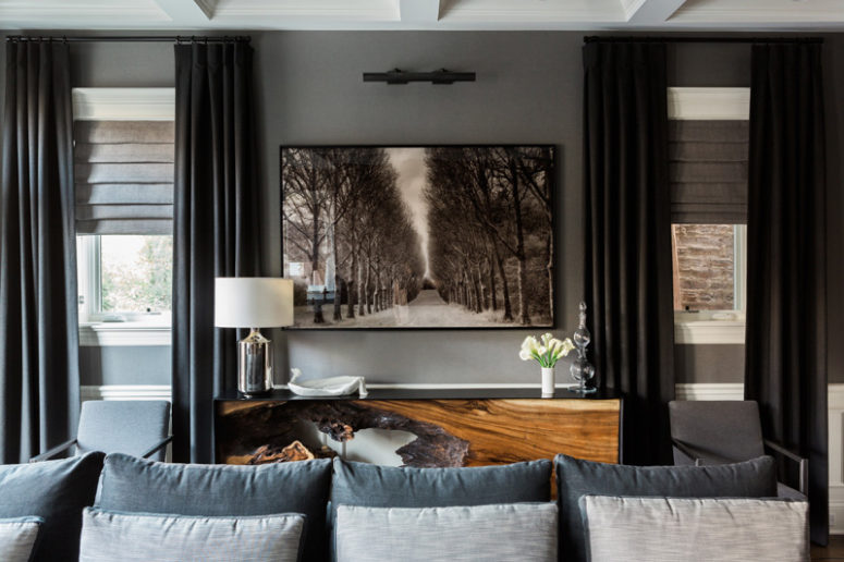This stunning dramatic home with an artistic feel, bold accents and moody spaces can be called jaw dropping because some of the spaces will really make you do that