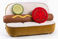 01 UN_LIMITED EDITIONS is a furniture collection inspired by fast food, the open hot dog bun is a sofa, a tomato and cucumber slice are pillows