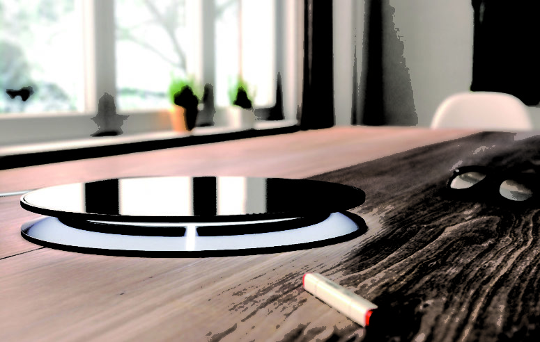 If an object is placed on the lamp, it swiches off and vice versa