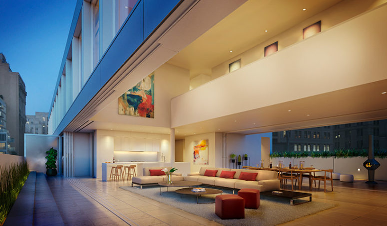 The kitchen is all-white, with sleek cabinets, there's a living room with neutral furniture and a dining space with mid-century modern chairs