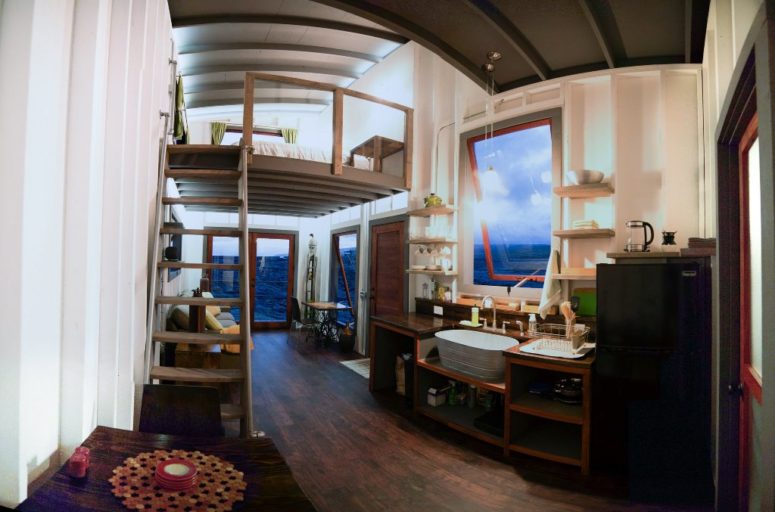 creative small kitchen design There's a small kitchen with a dining zone and a mezzanine level with a bedroom, the interior is really simple