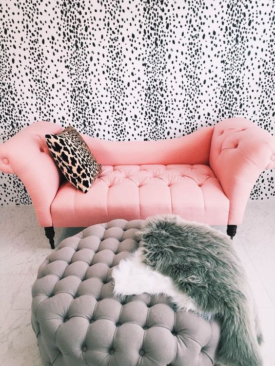 a glam girlish space with a dalmatian print wall, it looks cool and chic