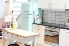 05 a mint Smeg fridge and a matching stool for a small and cozy neutral kitchen