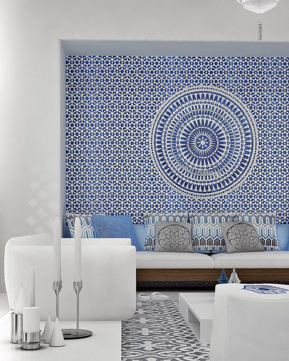the living room is done in white, greys and a beautiful shade of blue, the panelstops the show