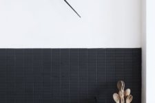 06 small matte black rectangular tile backsplash for an ultra-modern kitchen