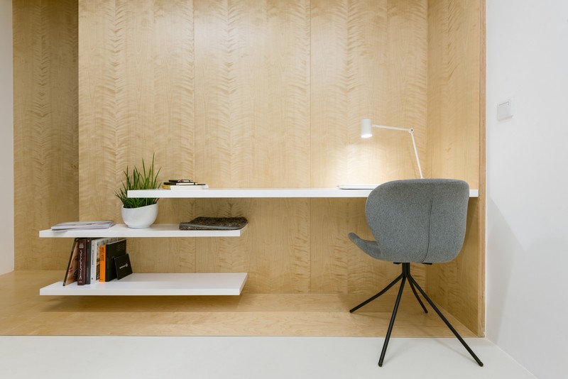The workspace is made up of three floating shelves, one of which is a desk, the other two are shelves for storage