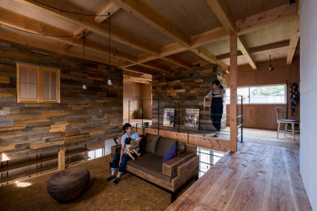 reclaimed wood Upstairs the space is widely clad with reclaimed wood, and usual wood covers the floors, ceilings and walls