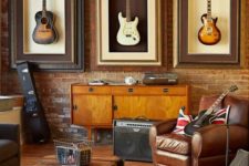 07 a chic modern space with an industrial feel, guitars displayed on the wall and leather furniture