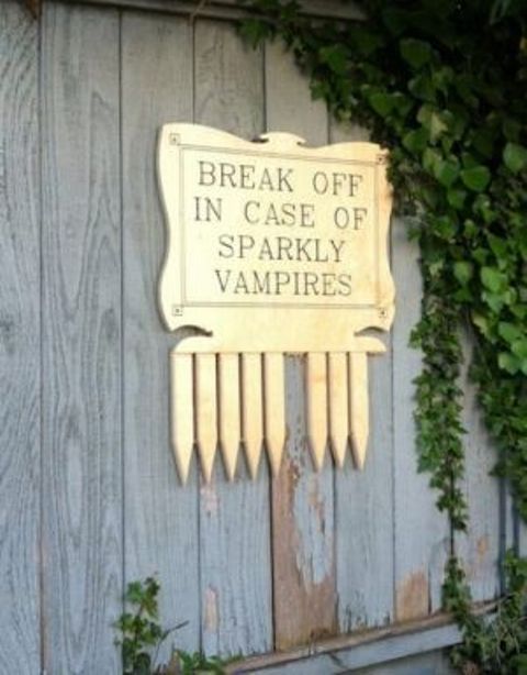 a gorgeous and funny sign of wood and with wood pieces in case of vampires