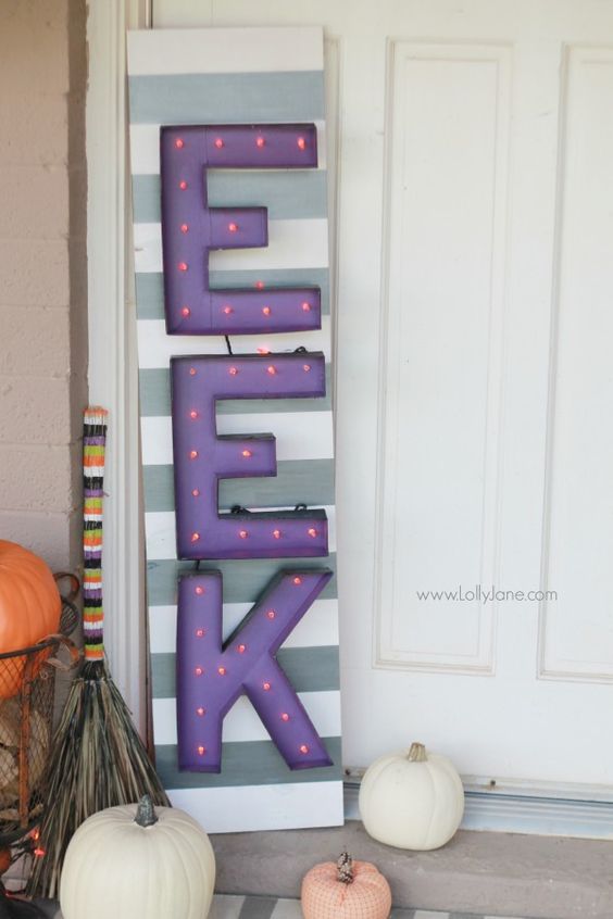 a cool EEK marquee sign for outdoor Halloween decor