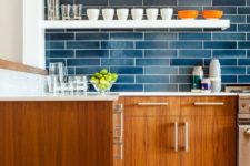 09 brick-inspired glossy blue tile backsplash with white grout to make it stand out