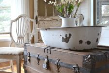 10 a rustic trunk for a cottage interior, works as a side table and a storage item