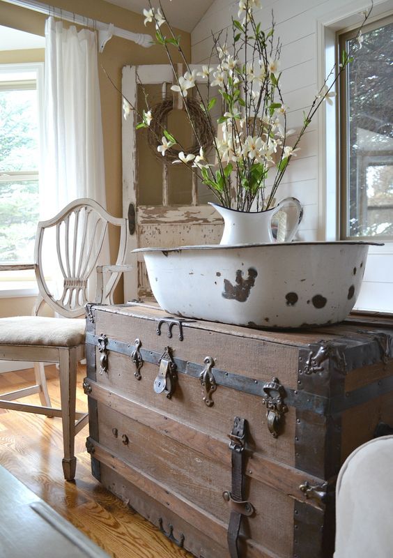 a rustic trunk for a cottage interior, works as a side table and a storage item