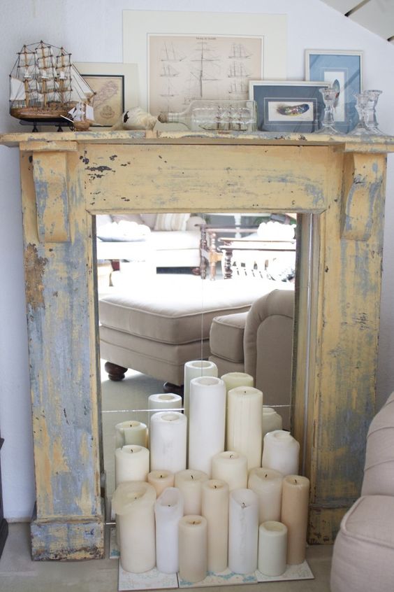How To Style An Antique Fireplace 27 Ideas Digsdigs An Antique Shabby Fireplace Clad With Wood Is Finished Mirror And Some Candles