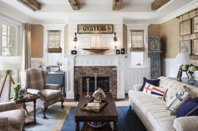 a rustic space with a brick clad fireplace, plaid chairs and a vintage blue clock