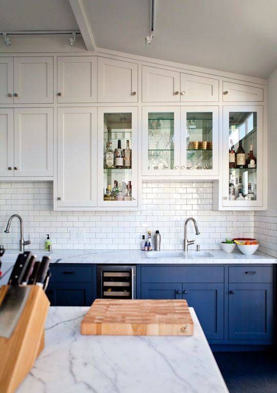 https://www.digsdigs.com/photos/2017/08/16-suspended-white-cabinets-and-cobalt-blue-ones-on-the-floor-create-a-light-airy-look.jpg