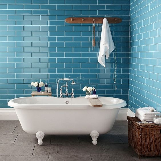 brick inspired glossy blue tiles for a cute bathroom with rustic touches