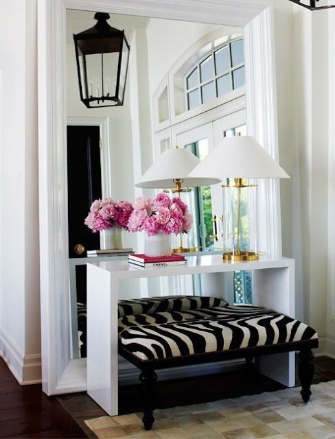 make a neutral makeup nook more eye-catching with a bold zebra print bench
