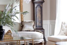 18 a luxurious interior with a grandfather’s clock, a refined sofa and an animal print-inspired rug