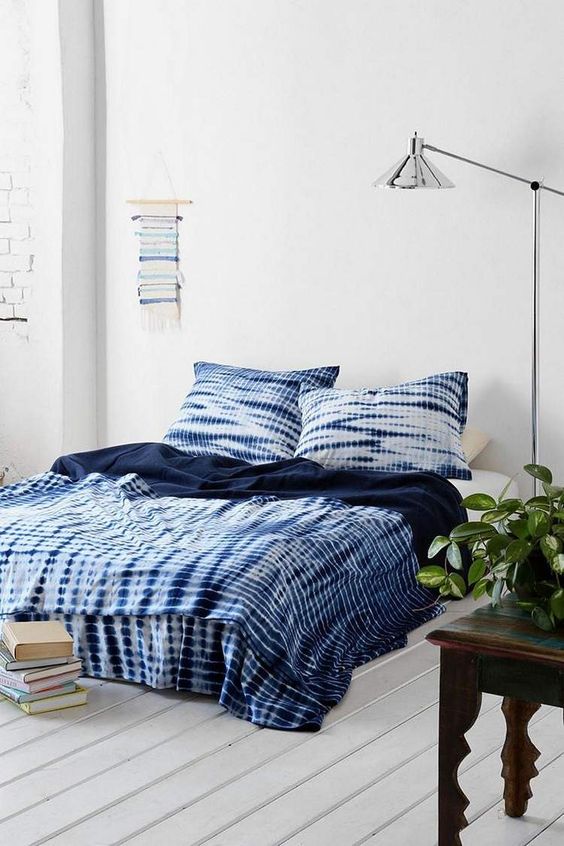 bring a trendy and edgy feel to your neutral bedroom with sibori bedding