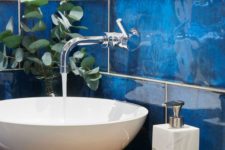 18 give your bathroom walls the wow factor with intense blue and glossy finish tiles