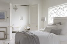 19 a modern white upholstered bed, rustic and shabby wooden beams and floors