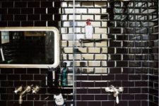 19 glossy black tiles make this masculine art deco bathroom amazing