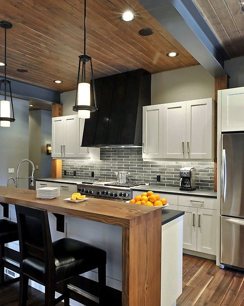 a two-level kitchen counter is ideal to fit every decor space - the kitchen and the living room around