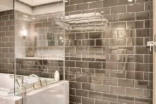 22 glossy chocolate brown tiles with white grout look timeless and classic, ideal for any modern space