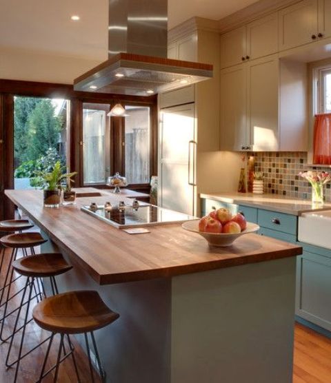 a kitchen island with an eating space counter is a great idea to save some space