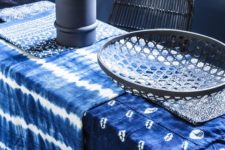 30 shibori tablecloths make this moody dining space cooler