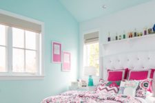 31 pink and turquoise bedding with various prints matches the same statement wall